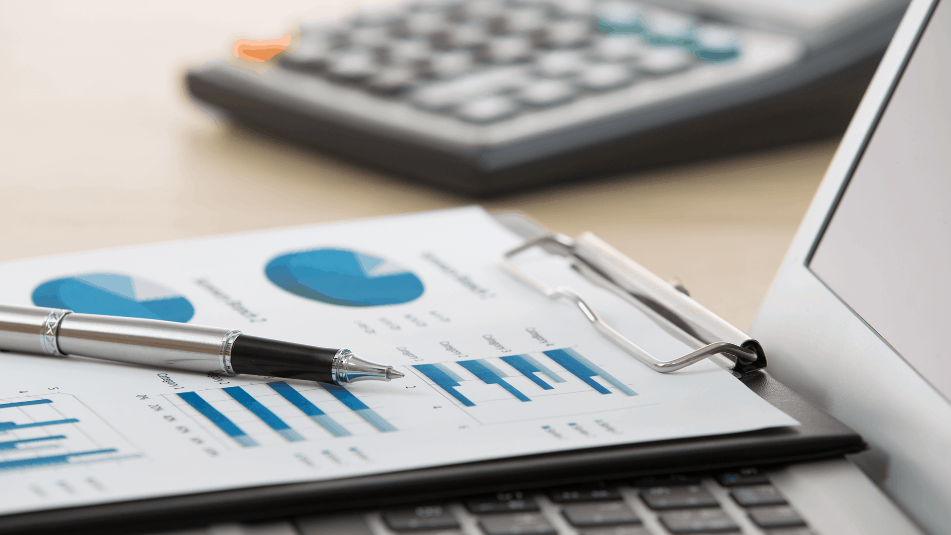 How do I pay less taxes - computer chart calculator at desk